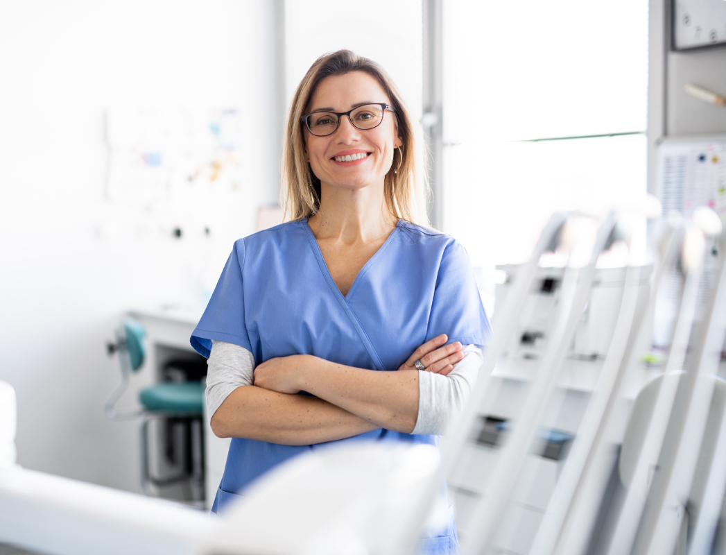 Friendly dental professional in a bright modern office